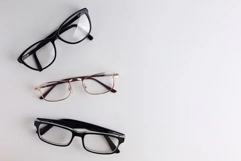 Glasses for vision correction on a light background with a place for text Stock Photos