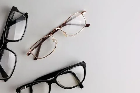 Glasses for vision correction on a light background with a place for text Stock Photos