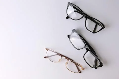 Glasses for vision correction on a light background with a place for text Stock Photos