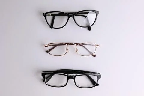 Glasses for vision correction on a light background with a place for text Stock Photos