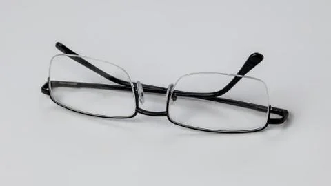 Glasses for vision on a light background. Stock Photos