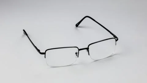 Glasses for vision on a light background. Stock Photos