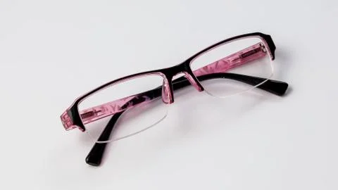 Glasses for vision on a light background. Stock Photos