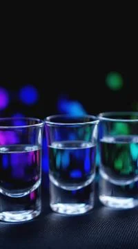 Glasses of vodka or tequila. In bar Stock Photos