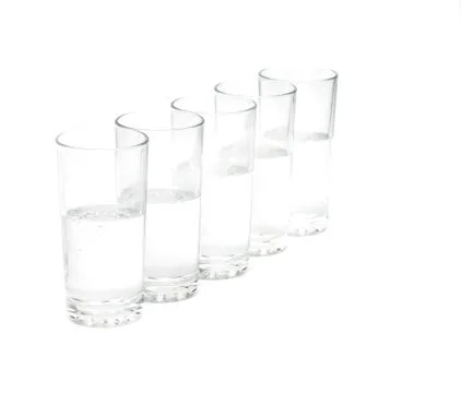 Glasses with water isolate on white background Stock Photos