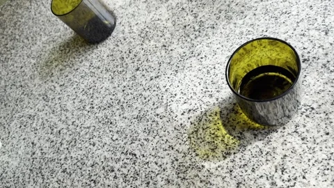 Glasses with water on marble table with shadows horizontal Stock Footage 329095772