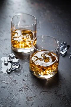 Glasses of whiskey with ice Stock Photos