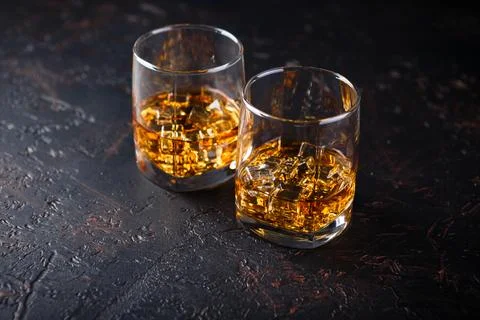 Glasses of whiskey with ice Stock Photos