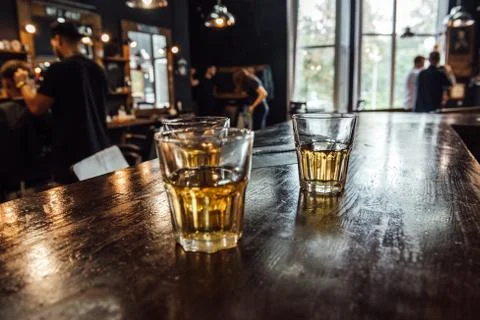 Glasses of whiskey on the table Stock Photos