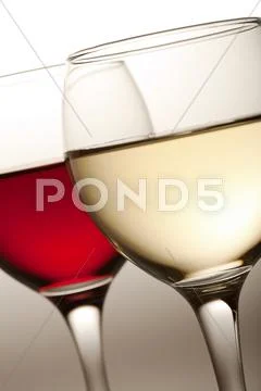 Glasses of white and red wine isolated Stock Photos