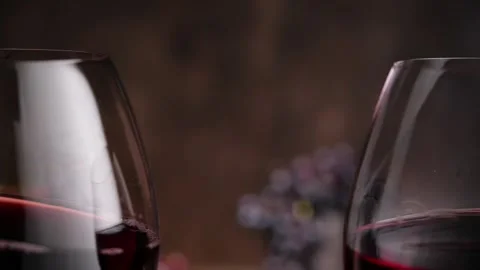 Glasses of wine clinking during toast Stock Footage 137409877