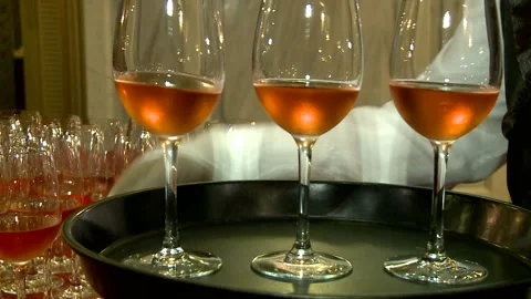 Glasses of wine on the spacing. Secular supper. Meeting with guests Stock Footage 90049396
