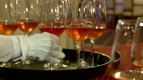 Glasses of wine on the spacing. Secular supper. Meeting with guests Stock Footage 90050540