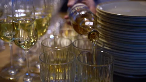 Glasses on the wine table at the celebration Stock Footage 246541327