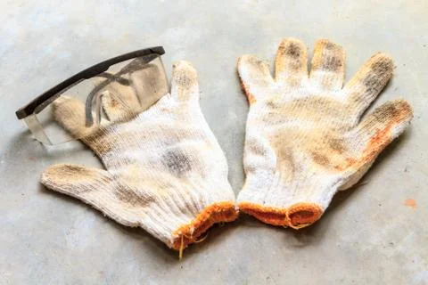 Glasses on workgloves Stock Photos