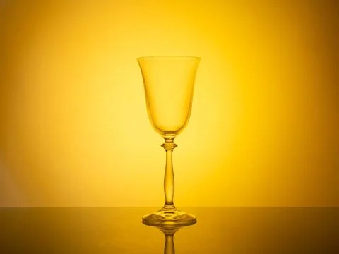 Glassware captured in creative backlight with vibrant colorful gel filters Stock Photos