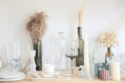 Glassware on wood table in warm tone Stock Photos