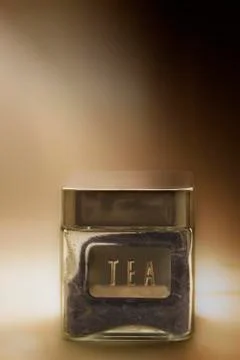 Glassy jar with tea Stock Photos