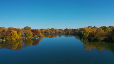 Glassy lake Fall Drone Stock Footage 146130559