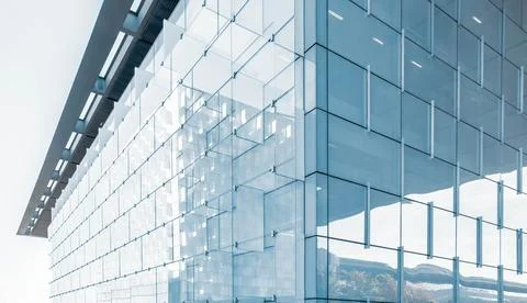 A glassy office building. Ilustración de archivo