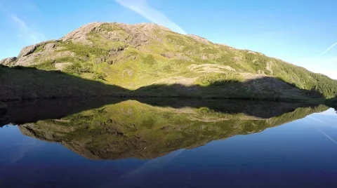 Glassy Pond With Mountain Reflection &amp; Rock Ripples With Natural Audio Stock Footage 51418067