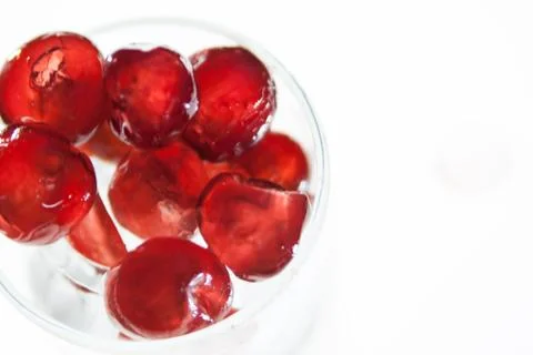 Glazed cherries with white back ground Stock Photos