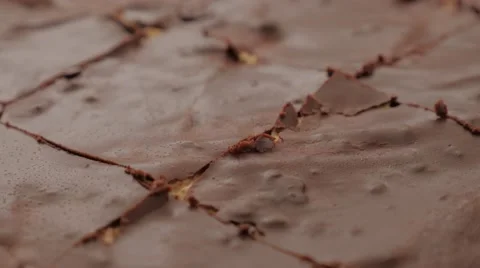 Glazed chocolate cake divided on smaller pieces slow tilt 4K 2160p UltraHD Stock Footage 51712506