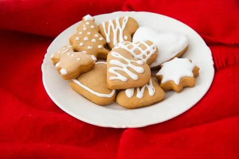 Glazed Christmas cookies shaped different. Stock Photos