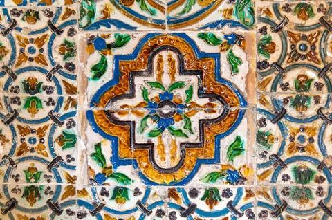 Glazed decorative ceramic tile panel on historic wall Stock Photos