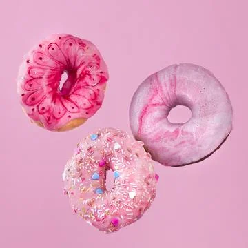 Glazed donuts motion High resolution photo Stock Photos