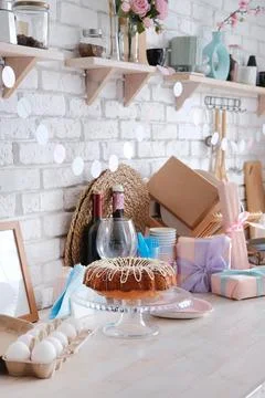 Glazed Easter cake on kitchen counter decorated for Easter Stockfoto's