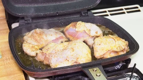 Glazed fried chicken or turkey in pan Stock Footage 82397318