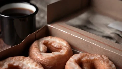 Glazed old fashioned style doughnut on dark background Stock Footage 157993105