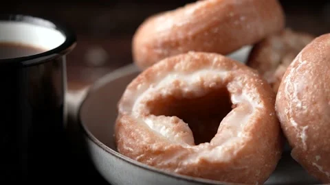 Glazed old fashioned style doughnut on dark background Stock Footage 157993886