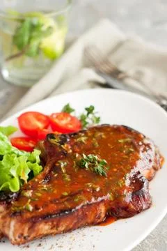 Glazed pork chops with vegetables Stock Photos
