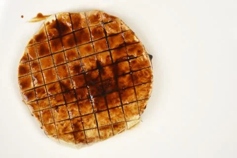 Glazed Scored Celeriac Root Slice on White Plate Stock Photos