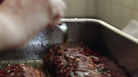 Glazing BBQ Ribs. Stock Footage 232970551