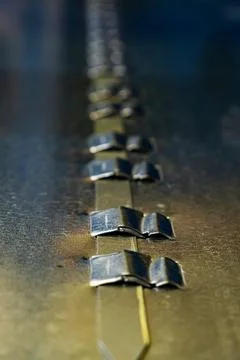 Gleaming Horizon: Array of Metal Objects on Polished Surface Stock Photos