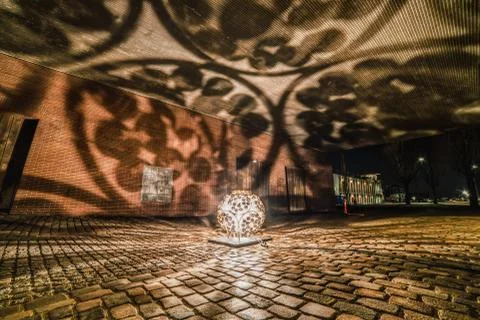 A Gleaming Orb casts dynamic shadows conveying powerful feelings and dark energy Stock Photos