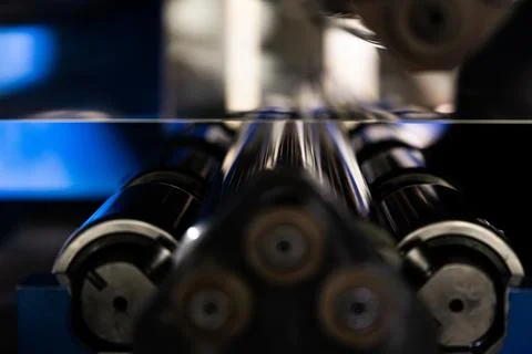 Gleaming Precision: Metal Coating Process Illuminated in a Russian Facility Stock Photos