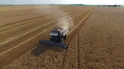 Gleaner Combine Pan Across - Drone Stock Footage 64978941