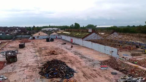 Glen Dimplex warehouse demolition aerial view over remains of factory building Stock Footage 345409469