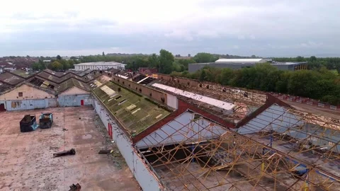 Glen Dimplex warehouse demolition aerial view across remains of factory building Stock Footage 345409745