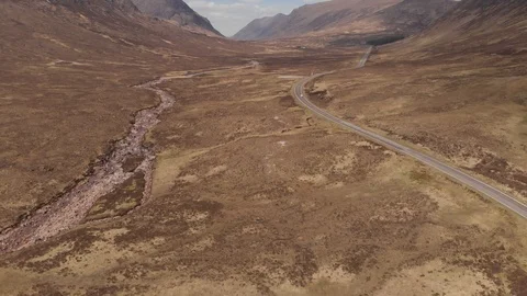 Glencoe Scotland Mountain Range Glen Valley Panning Up Moorland Aerial Cine D Stock Footage 108150784