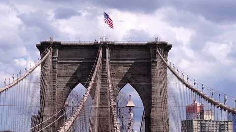 Glide moving shot of Brooklyn Bridge towers over the Hudson River in New York  Stock Footage 119043152