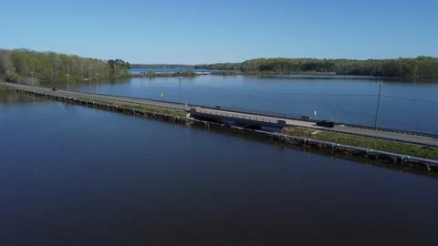 Glide slope down to bridge over water Video stock 238033718