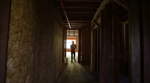Glidecam Man with Blueprints on Construction Site Stock Footage 34402320