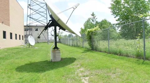 Glidecam smooth shot through satellite dishes Stock Footage 50966835