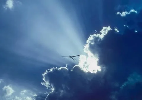 Glider and cumulus cloud Stock Photos
