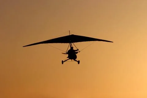 Glider and sunset Stock Photos